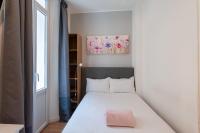 Hotel l'Hotera客房内的一张或多张床位
