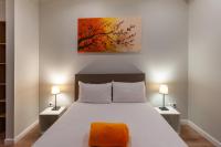 Hotel l'Hotera客房内的一张或多张床位