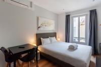 Hotel l'Hotera客房内的一张或多张床位