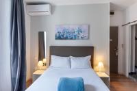 Hotel l'Hotera客房内的一张或多张床位