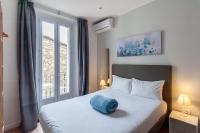 Hotel l'Hotera客房内的一张或多张床位