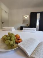 Apartments MilaRoza客房内的一张或多张床位