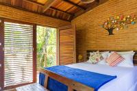 Oca Paraty Chalé Ecológico客房内的一张或多张床位