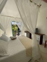 Villa Tiê Paraty客房内的一张或多张床位