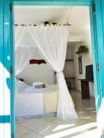 Villa Tiê Paraty客房内的一张或多张床位