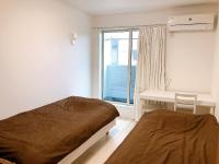 Ano House 女性専用Women's Guesthouse客房内的一张或多张床位