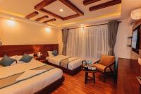 Kathmandu Aagantuk Hotel客房内的一张或多张床位