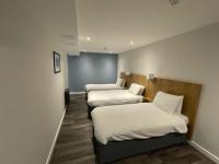 Loch Lomond Hotel客房内的一张或多张床位