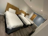 Loch Lomond Hotel客房内的一张或多张床位