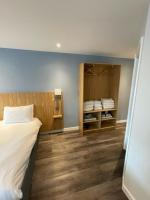 Loch Lomond Hotel客房内的一张或多张床位