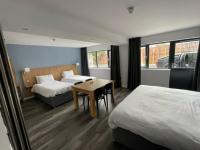Loch Lomond Hotel客房内的一张或多张床位