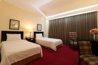 Bayview Park Hotel Manila客房内的一张或多张床位