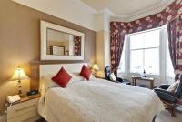 Lauriston &amp; Lawton Court Hotel客房内的一张或多张床位