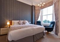 Lauriston &amp; Lawton Court Hotel客房内的一张或多张床位
