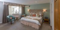 Best Western Moores Central Hotel客房内的一张或多张床位