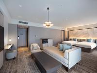 ORIENTAL HOTEL UNIVERSAL CITY客房内的一张或多张床位
