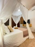 Villa Tiê Paraty客房内的一张或多张床位