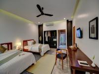 Tanei Angkor Resort and Spa客房内的一张或多张床位