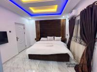 Gillant Luxury Homes客房内的一张或多张床位