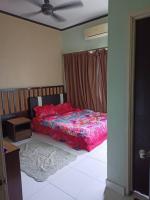 zous homestay客房内的一张或多张床位