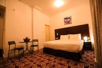 AL KARNAK HOTEL - BRANCH客房内的一张或多张床位