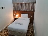 AL KARNAK HOTEL - BRANCH客房内的一张或多张床位