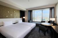 KOKO HOTEL Premier Kumamoto客房内的一张或多张床位