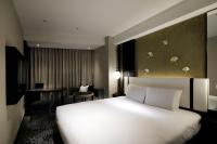 KOKO HOTEL Premier Kumamoto客房内的一张或多张床位