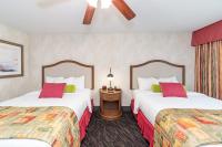 Bellissimo Hotel, Trademark by Wyndham Near Foxwoods Casino客房内的一张或多张床位