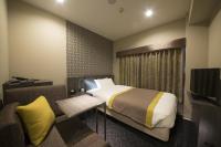 Almont Inn Tokyo Nihonbashi客房内的一张或多张床位