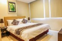 The Exchange Regency Residence Hotel Managed by HII客房内的一张或多张床位