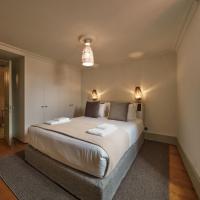 Look Living, Lisbon Design Apartments客房内的一张或多张床位
