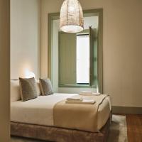 Look Living, Lisbon Design Apartments客房内的一张或多张床位