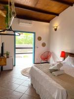 Villa Tiê Paraty客房内的一张或多张床位