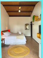 Villa Tiê Paraty客房内的一张或多张床位