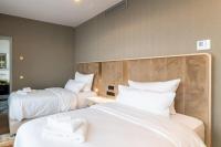 Fourty Three Luxury Serviced Apartments客房内的一张或多张床位