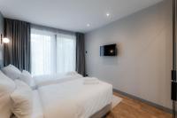 Fourty Three Luxury Serviced Apartments客房内的一张或多张床位