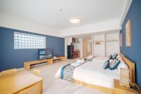 谷町君 HOTEL 恵美須町72客房内的一张或多张床位