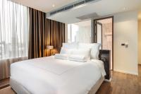 MUU Bangkok, Small Luxury Hotels of the World客房内的一张或多张床位