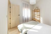 Apartamentos PROGRESO客房内的一张或多张床位