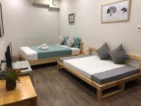 Hanoi Secret Garden客房内的一张或多张床位