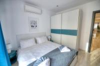 Modern and bright 2bedroom with terrace SARD1-1&#x5BA2;&#x623F;&#x5185;&#x7684;&#x4E00;&#x5F20;&#x6216;&#x591A;&#x5F20;&#x5E8A;&#x4F4D;