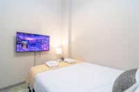 Modern 2BR in South Loop Near Soldier Field, Grant Park, Downtown, &amp; Lakefront Trail客房内的一张或多张床位