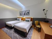 Citadines Connect Georgetown Penang客房内的一张或多张床位