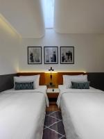 Citadines Connect Georgetown Penang客房内的一张或多张床位