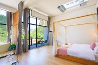 Sure I Do全景山宿客房内的一张或多张床位