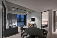 Nesuto Docklands客房内的一张或多张床位