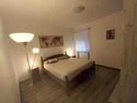 appartamento la pineta IT010-058C20-TJ54093客房内的一张或多张床位