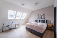limehome Stuttgart Elsenhansstr客房内的一张或多张床位