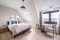 limehome Stuttgart Elsenhansstr客房内的一张或多张床位